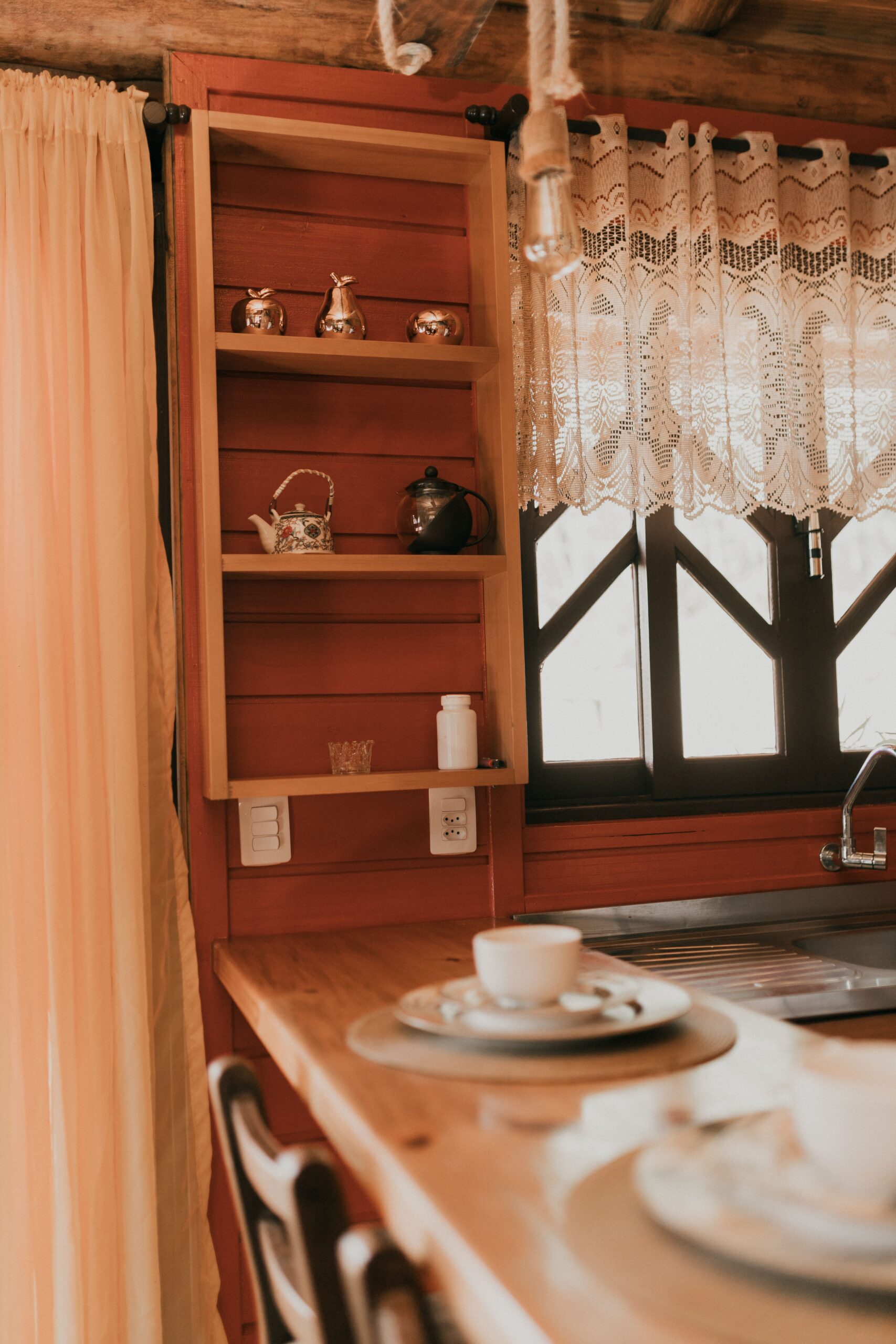 Warm and inviting rustic kitchen scene with vintage decor and soft natural light.